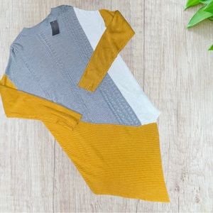 Suzy shier- yellow long sleeve with a symmetrical look!